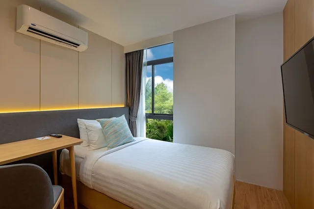 جناح عائلي بريميوم بسرير كينج وسرير فردي، Wyndham Garden Naithon Phuket 2/3