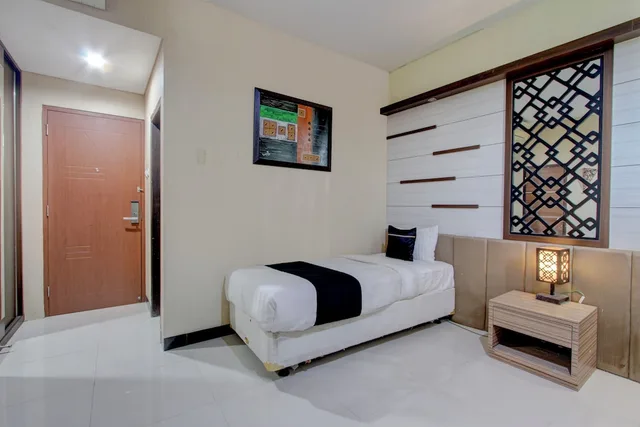 غرفة ديلوكس بسريرين منفصلين، Collection O near Stadion Manahan formerly Graha Laweyan Solo 4/6