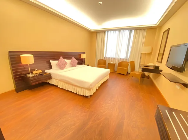 غرفة قياسية بسرير كينج وسريرين منفصلين، Savan Resorts 1/11