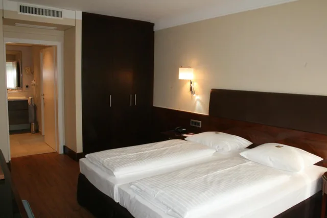 غرفة ديلوكس رباعية بسرير كينج، TOP Hotel Duerer 8/10