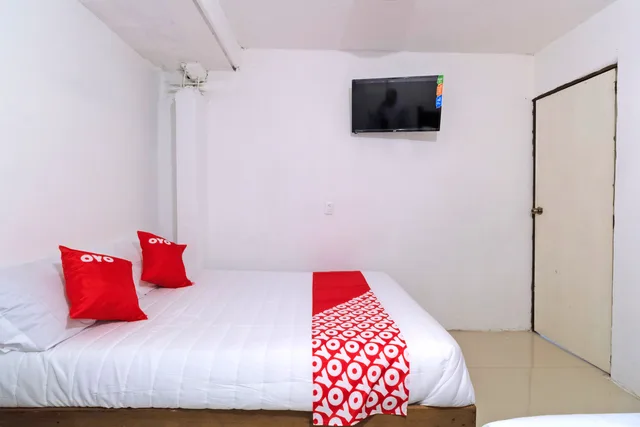 غرفة قياسية بسريرين، OYO Hotel Punta Guadalupe, San Cristobal de las Casas 3/6