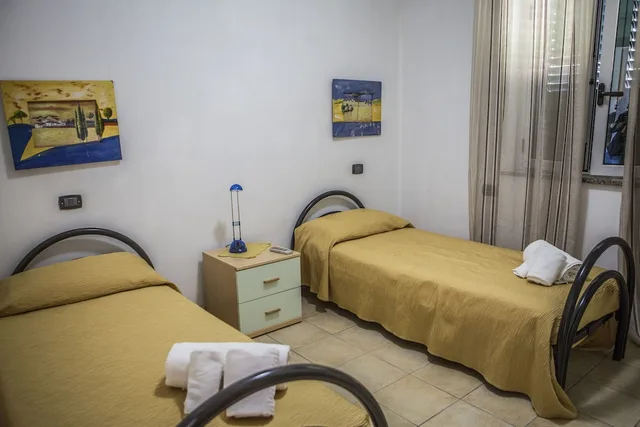 شقة سوبيريور بسرير كوين وسريرين منفصلين بغرفتي نوم، Il Calabriano Villaggio Residence 6/6