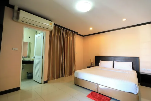 غرفة قياسية بسرير كينج، Triton Place 1/10