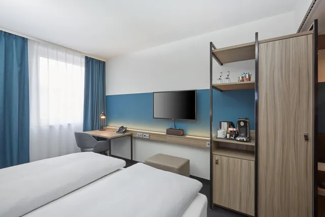 غرفة كومفورت بسرير كينج، H4 Hotel Leipzig 4/10