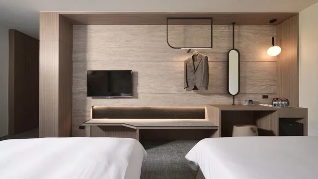 غرفة ديلوكس رباعية بسرير مزدوج وسريرين منفصلين، Haifu Hotel And Suites 1/2