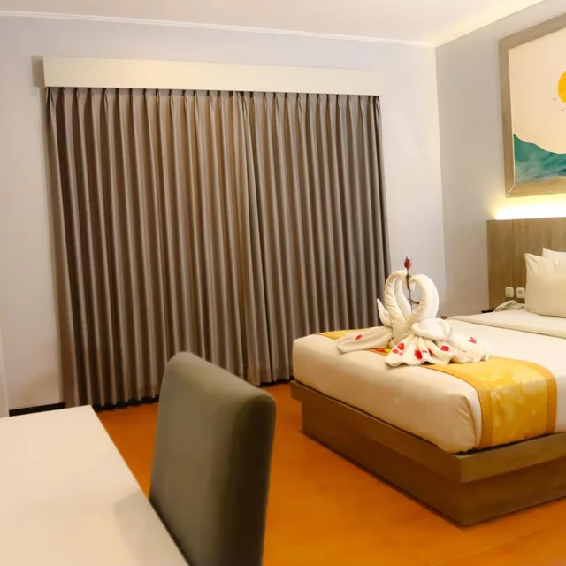غرفة ديلوكس بسرير كوين، Front One Hk Resort Semarang 4/6