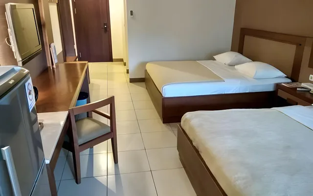 غرفة ديلوكس بسريرين كينج بإطلالة على الحديقة، Pantai Indah Resort Hotel Timur 1/1