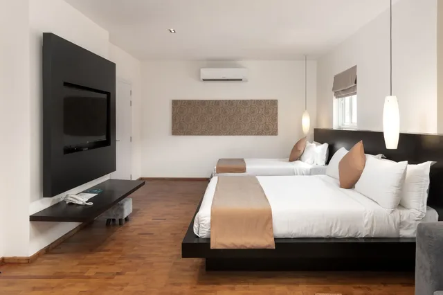 شقة عائلية بسرير كوين وسرير فردي، Tao Riverside Residence 1/4