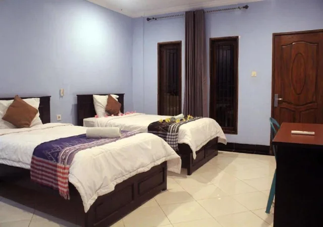 غرفة قياسية بسريرين منفصلين بإطلالة على الحديقة، Ridho Malik Hotel 3/7