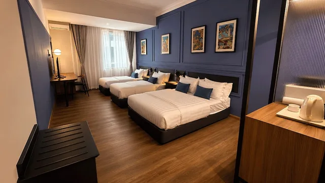 غرفة عائلية رباعية بسرير كوين وسريرين منفصلين بإطلالة على المدينة، Kuala Lumpur International Hotel 2/5