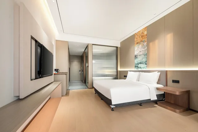 غرفة قياسية بسرير كينج في طابق مرتفع، Holiday Inn Express Qidong Economic Zone 3/4