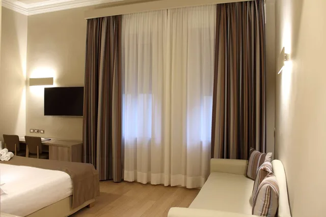 غرفة كومفورت بسرير كينج مع أريكة، Best Western Hotel Moderno Verdi 3/5