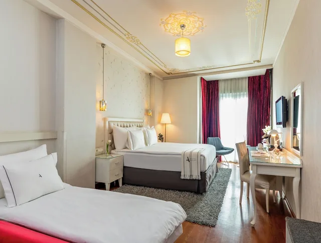 غرفة ديلوكس ثلاثية بغرفة نوم واحدة، Hotel Amira Istanbul 2/8