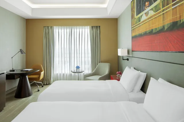 غرفة سوبيريور بسريرين منفصلين، Radisson Blu Faridabad 1/4