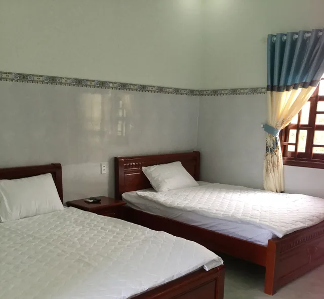 غرفة أساسية بسريرين كوين بإطلالة على المسبح، Hotel Nguyen Toan 4/8