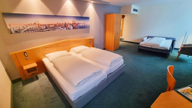 غرفة بسرير كينج مع سرير إضافي، Hotel Panorama Hamburg-Harburg 8/10
