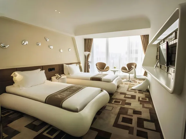 غرفة بريميير بسريرين منفصلين، Planet Hotel 1/5