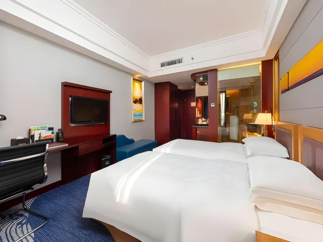 غرفة تنفيذية بسريرين منفصلين بإطلالة على المدينة، Zhuhai Charming Holiday Hotel 1/2