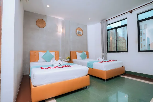 غرفة بسريرين منفصلين بحمام مشترك، Grand Elevation Hotel 4/10