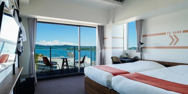 غرفة سوبيريور بسريرين منفصلين بإطلالة على البحر بشرفة، SETOUCHI KEIRIN HOTEL 10 by Onko Chishin 1/3