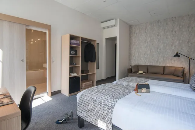 غرفة رباعية بسريرين منفصلين وأسرّة بطابقين، Hotel Saint Gothard 5/8