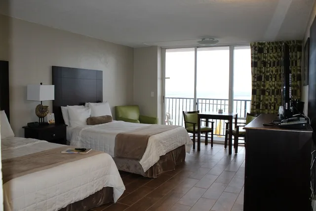 غرفة قياسية بسريرين مزدوجين بإطلالة جزئية على البحر، Cove Motel Oceanfront 4/4