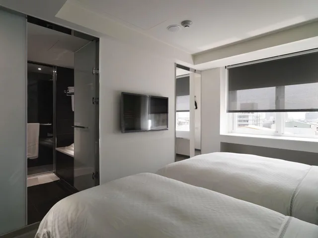 غرفة ديلوكس ثلاثية بسرير مزدوج وسرير فردي، CityInn Hotel Plus Taichung Station Branch 2/3