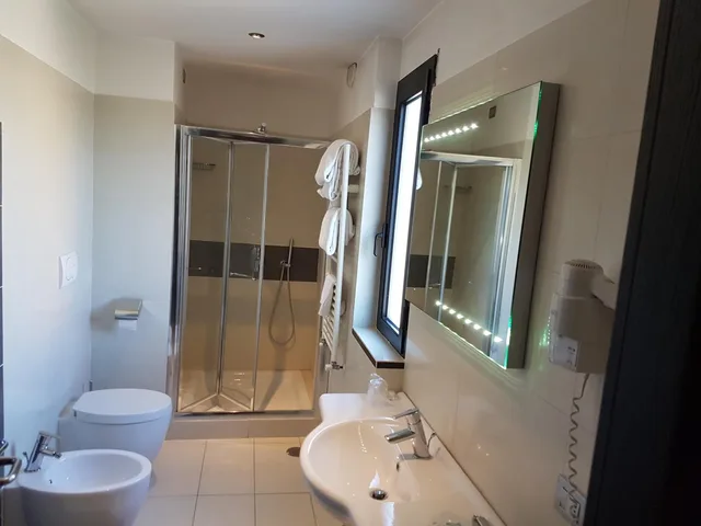 غرفة ديلوكس ثلاثية، Hotel Ristorante La Campagnola 3/4
