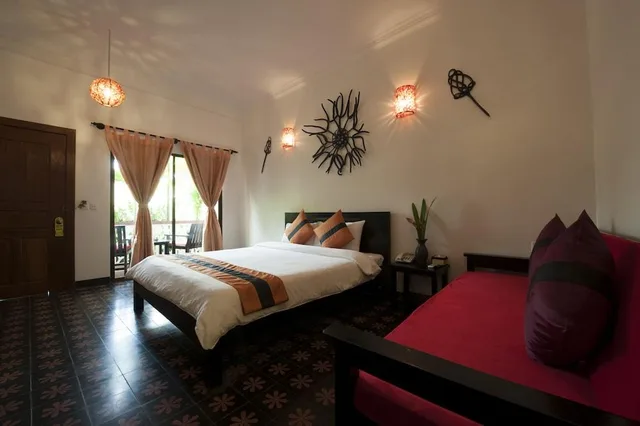 غرفة ديلوكس بسرير مزدوج بإطلالة على المسبح، La Niche d Angkor Boutique Hotel 3/3