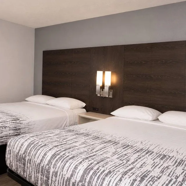 Room, Quadruple, 2 Queen Beds, Exterior Entrance، Masters Inn Augusta 3/10