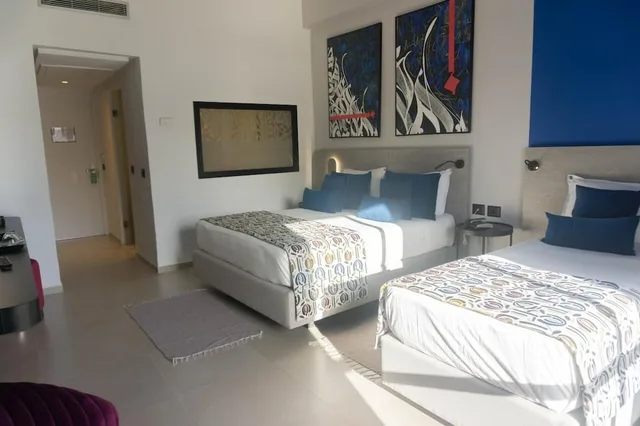 غرفة قياسية رباعية بسرير مزدوج وسريرين منفصلين، Hotel Golf Residence 9/10