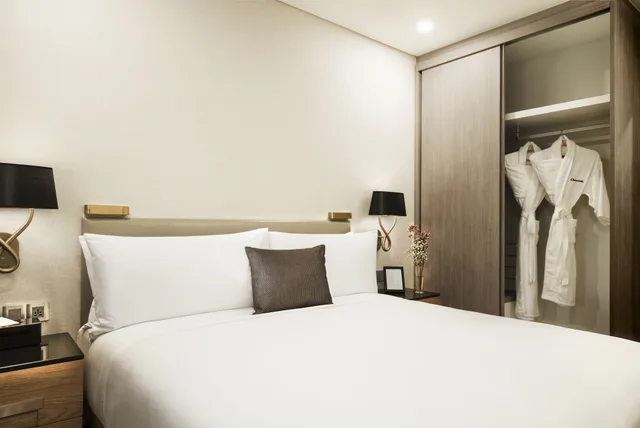 شقة ديلوكس بسريرين كينج وسرير فردي بـ3 غرف نوم، Oakwood Residence Saigon 2/6