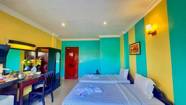 غرفة ديلوكس بسرير كينج بإطلالة على المسبح، Harmony Indochine d'Angkor 3/10
