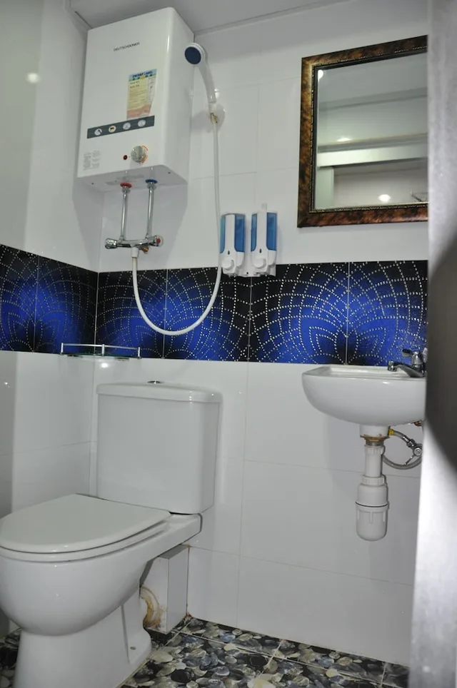 غرفة ثلاثية بسرير مزدوج وسرير فردي، New Guangzhou Guest House 4/4