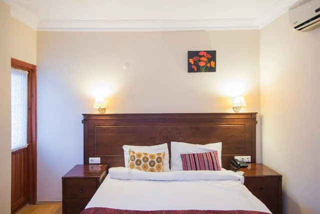 غرفة ديلوكس ثلاثية بسرير كوين وسرير فردي، Berce Hotel 2/4