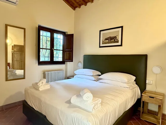 غرفة عائلية بسريرين كينج بإطلالة على الحديقة مع أريكة، Villa Castiglione 3/10