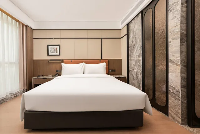غرفة بزنس بسرير كينج، Wyndham Fuzhou Gulou 1/3
