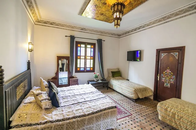 غرفة قياسية رباعية بسرير فردي، RIAD JARDIN CHRIFA 1/1