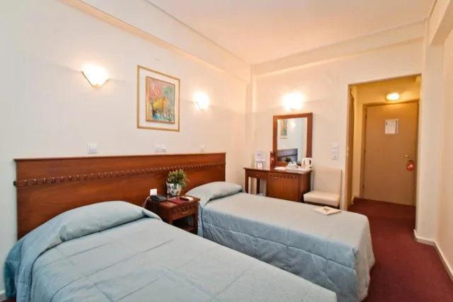غرفة اقتصادية بسرير مزدوج أو سريرين منفصلين، Triton Hotel 1/4