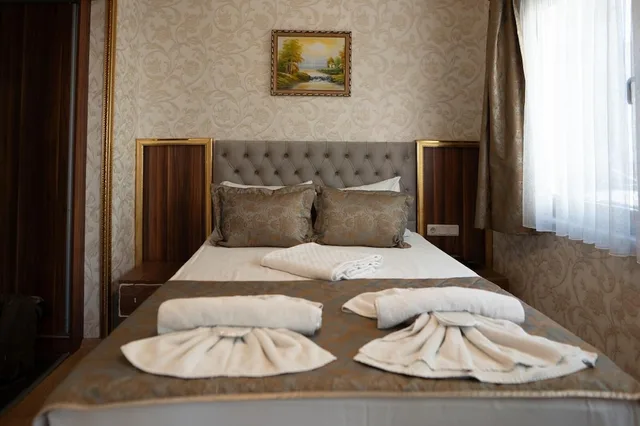 غرفة سوبيريور ثلاثية بسرير مزدوج وسرير فردي، Angel's Garden Hotel 1/10