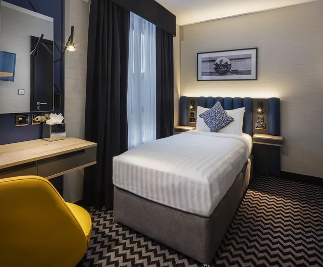 غرفة مفردة، Academy Plaza Hotel 4/7