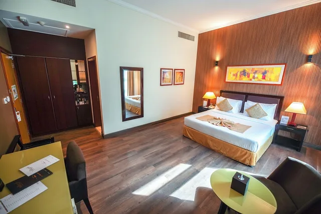 غرفة ديلوكس بسرير كينج للمدخنين، Villaggio Hotel and Resort Abu Dhabi 1/10