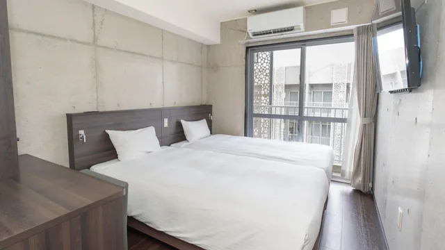 Room, Twin Beds, New Wing, The Breakfast Hotel Porto Ishigaki 1/3