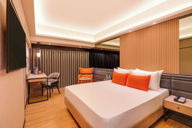 غرفة بريميوم بسرير كوين، Grand Hometel Malad 1/7