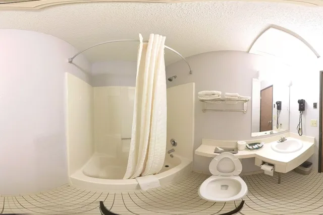 غرفة قياسية بسرير كينج، Coratel Inn & Suites by Jasper Hastings 9/10