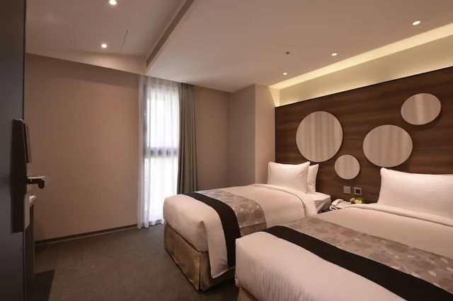 غرفة قياسية بسريرين منفصلين، Green World Hotel Songshan 2/5