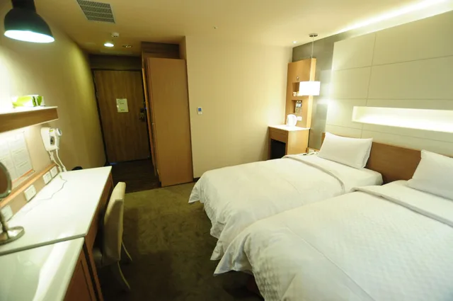 غرفة بسريرين منفصلين، Kindness Hotel - Sanduo Shopping District 8/10