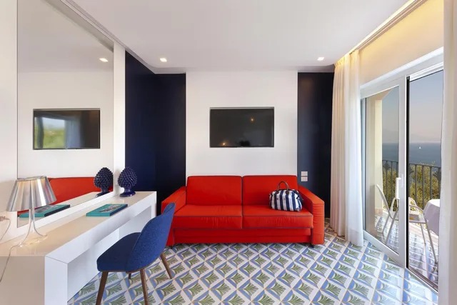 غرفة بريميوم بسرير مزدوج أو سريرين منفصلين بإطلالة جزئية على البحر، Grand Hotel Riviera 4/8