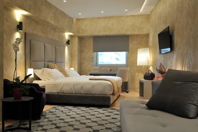 غرفة ديلوكس بسرير كينج مع أريكة، Athenaeum Grand Hotel 3/5