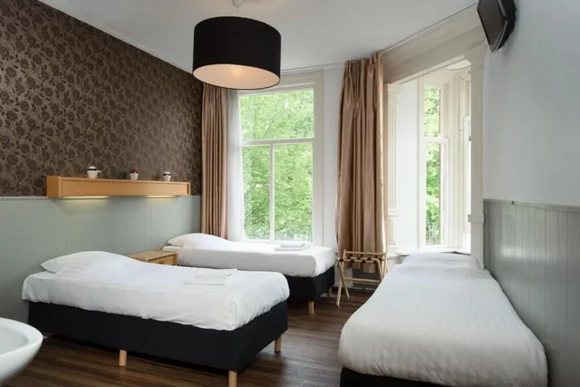 غرفة كومفورت ثلاثية، Amsterdam Inn Hotel 2/4